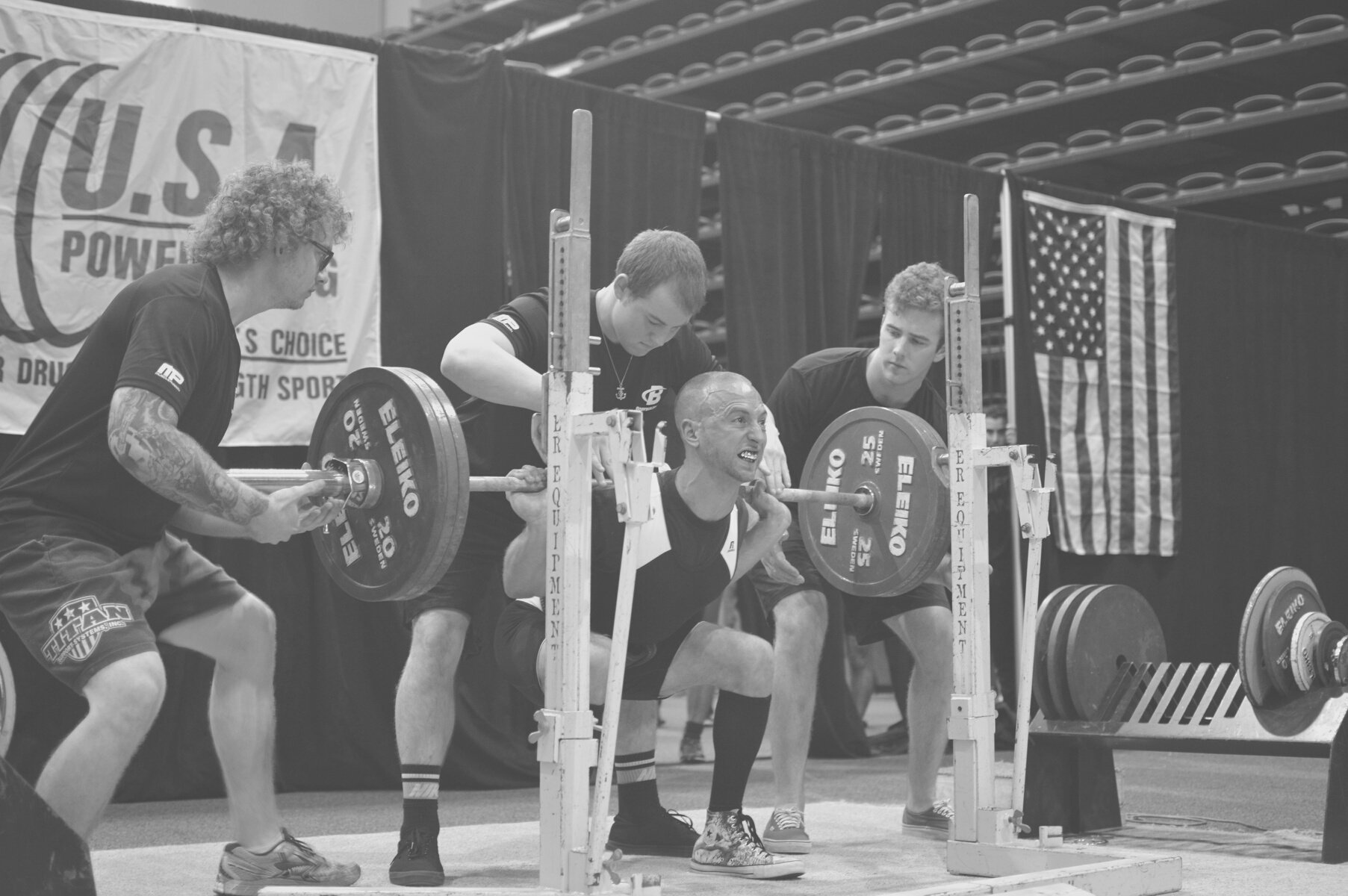 man squatting 400 lbs. event powerlifting photography with florida photographer. Antonino Nino Bologna.