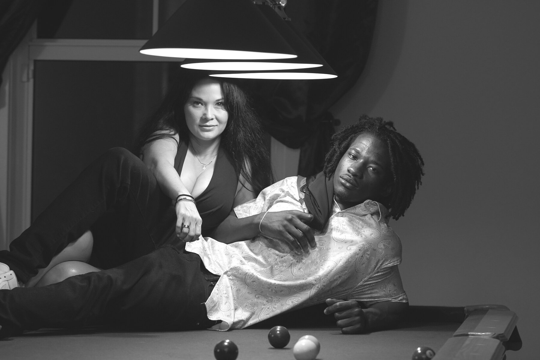 couple on pool table. florida photographer. portrait photography by Antonino Bologna.